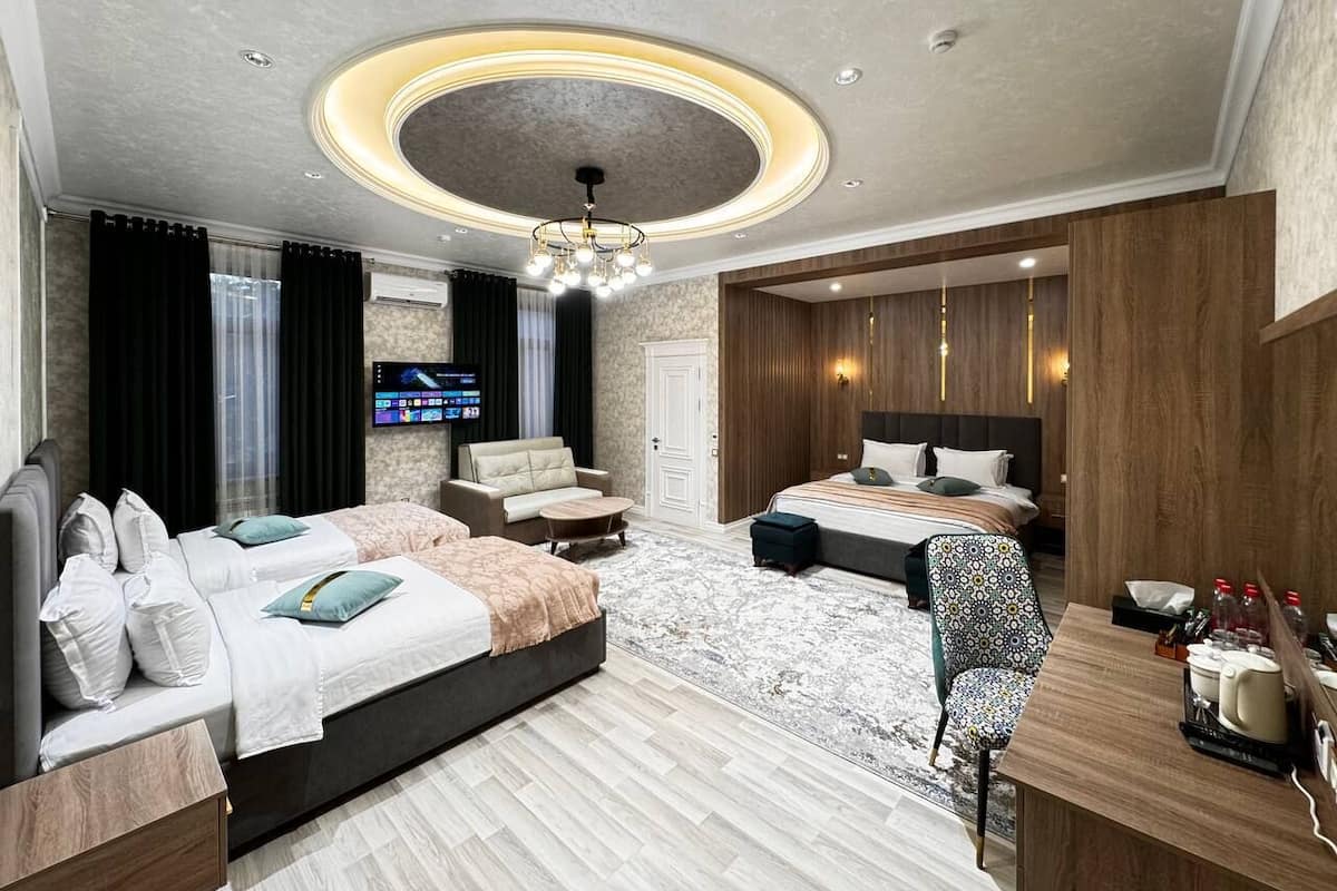 Quadruple Room, Air conditioning, City View | In-room safe, desk, laptop workspace, blackout drapes