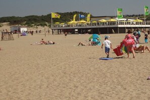 Relax on the beach with lifeguard service, umbrellas, and sun loungers available.