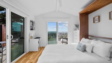 1 bedroom, desk, iron/ironing board, travel crib