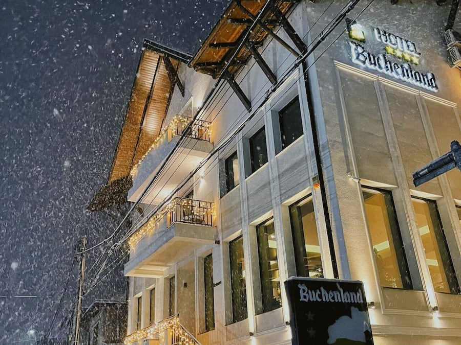A hotel with a sign reading "Hotel Buchenthal."