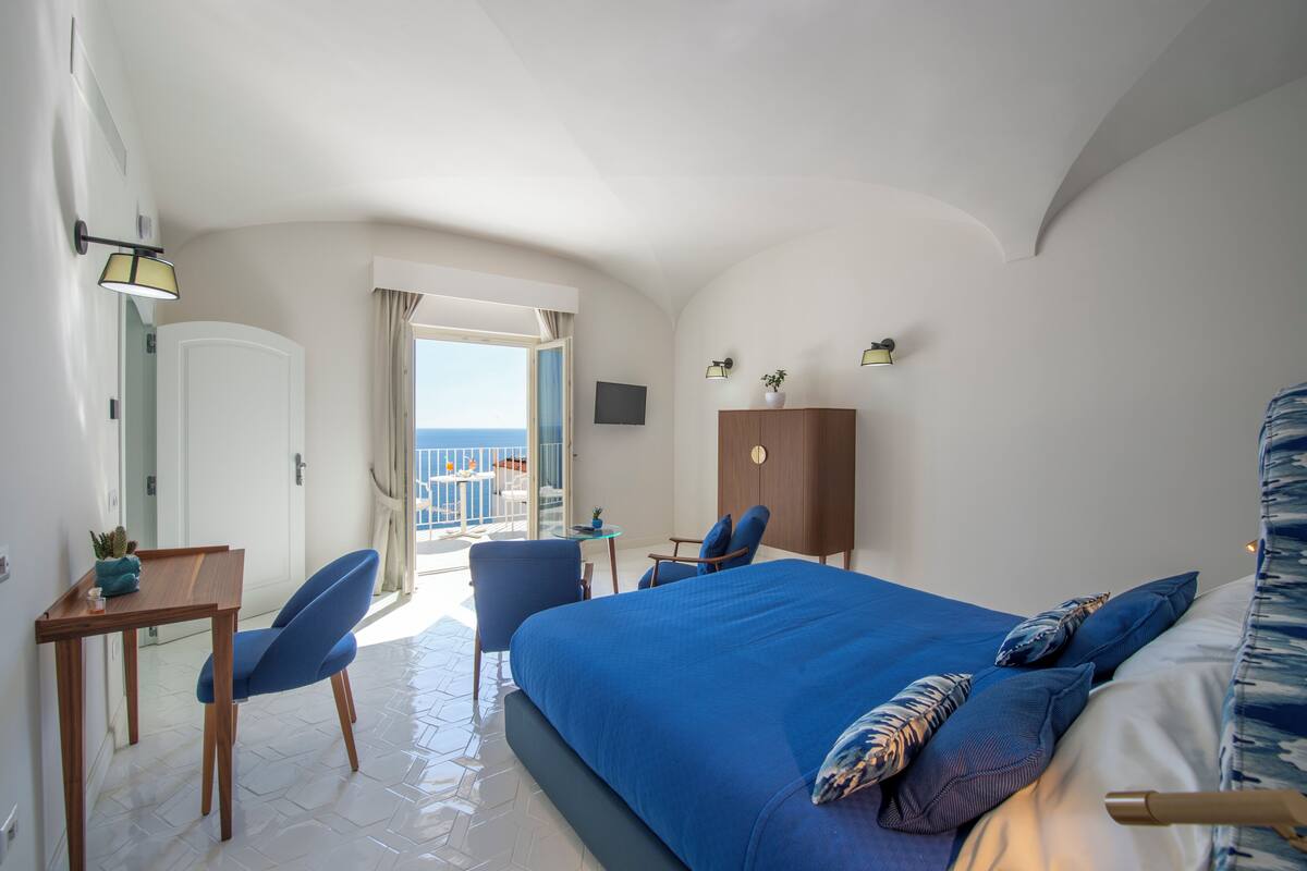 Superior Triple Room, Sea View | In-room safe, desk, laptop workspace, blackout drapes