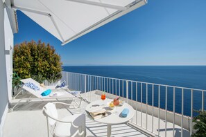 Superior Triple Room, Sea View | Terrace/patio - Infinity Suites Praiano (Praiano)