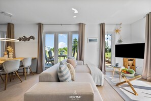 Télévision, cheminée, vidéothèque