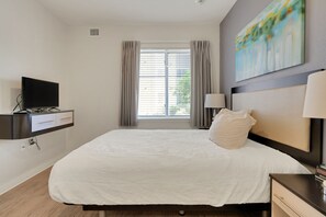 1 bedroom, desk, iron/ironing board, travel crib