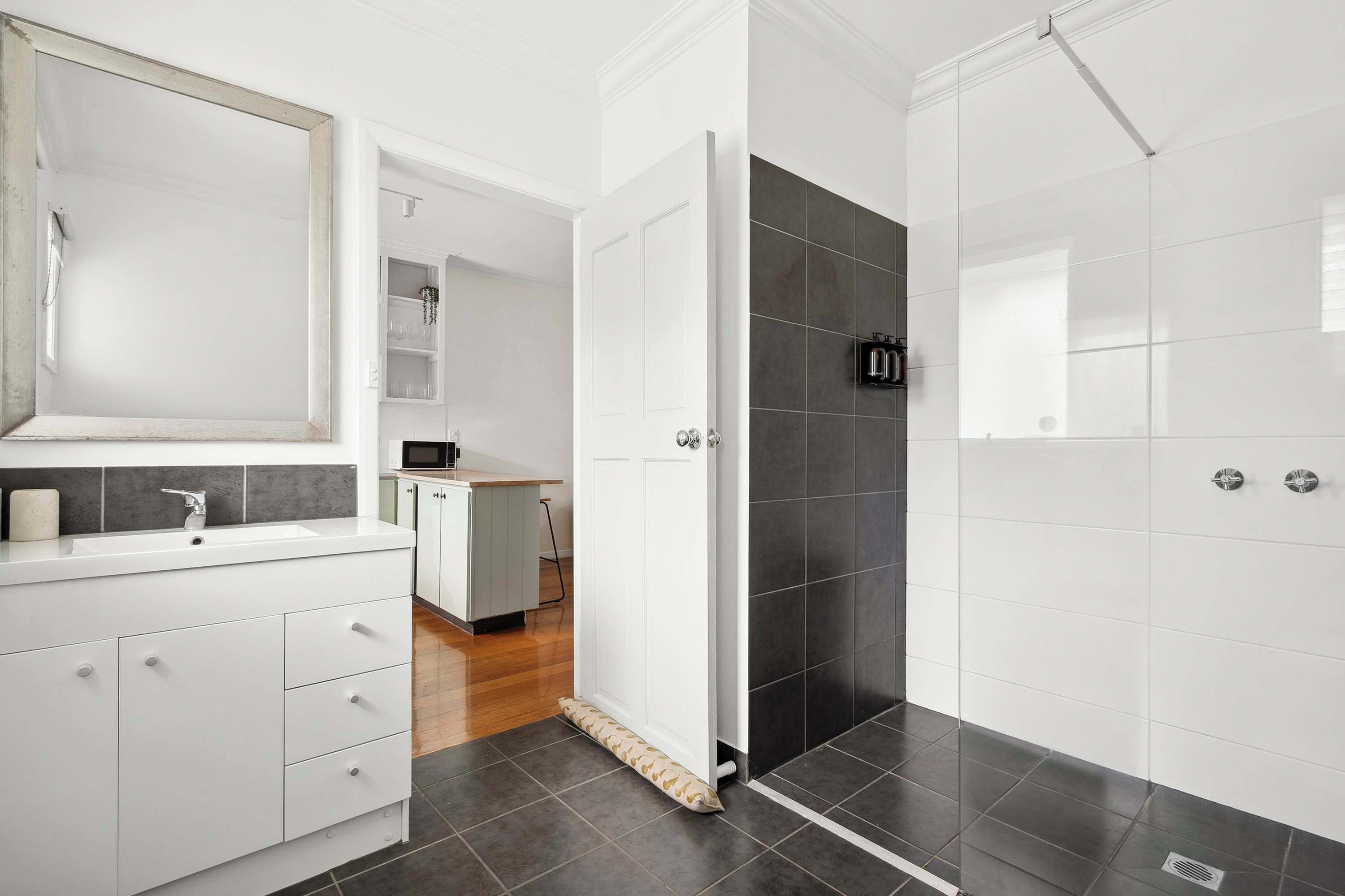 Shower, hair dryer, towels, shampoo