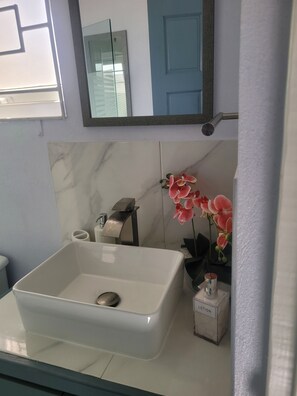 Hair dryer, towels, soap, shampoo