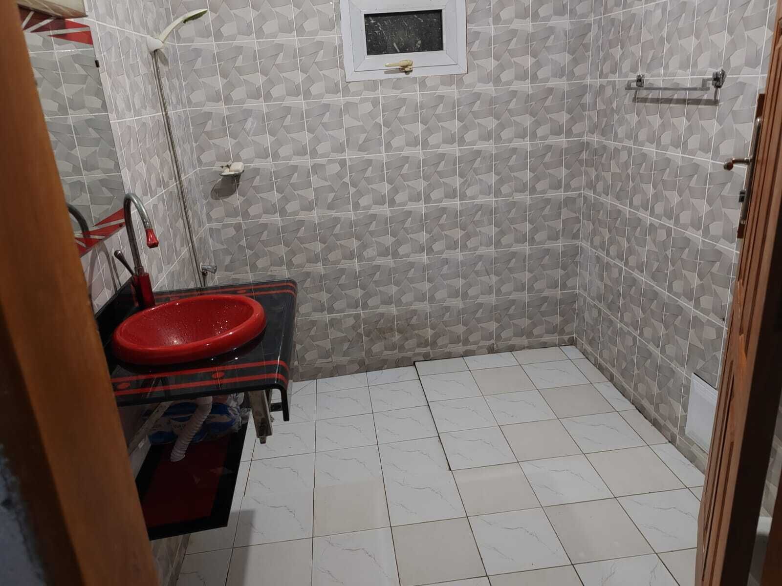 Shower, towels, soap, toilet paper