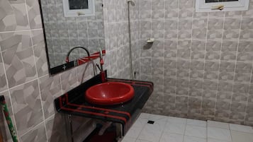 Shower, towels, soap, toilet paper