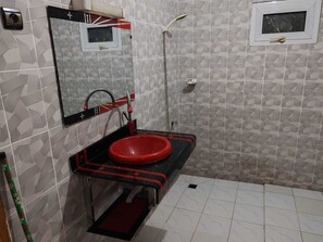 Shower, towels, soap, toilet paper