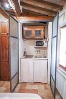 Monolocale Exclusive, vista città, secondo piano senza ascensore | Private kitchen