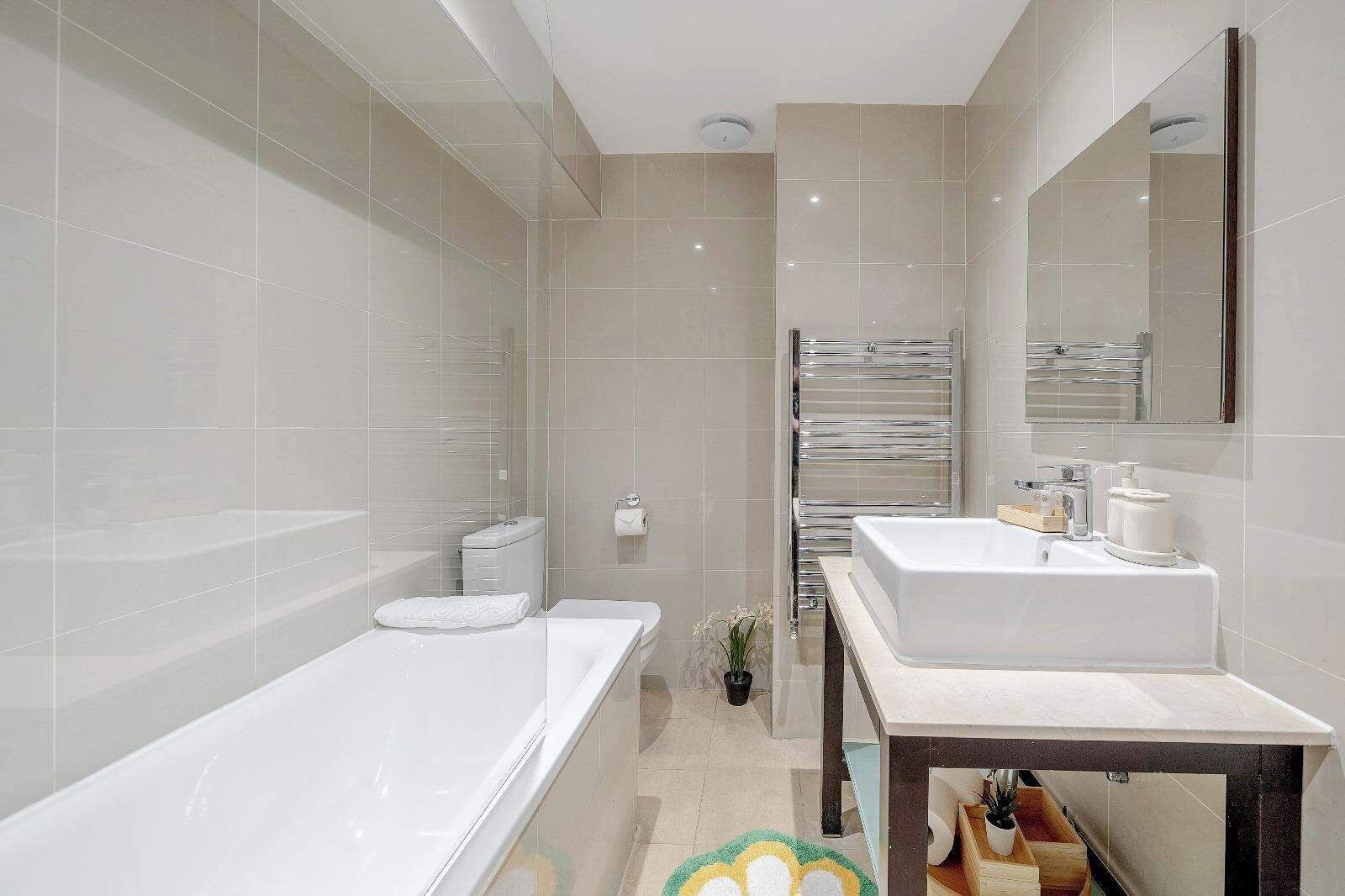 Shower, hair dryer, towels, shampoo