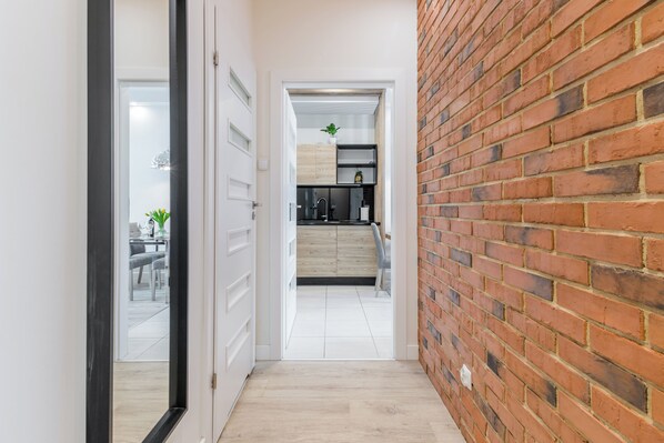 Comfort Apartment, 1 Bedroom, Balcony, River View | Living area | 30-inch flat-screen TV with cable channels - Hopfen by Little Heaven (Gdansk)