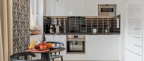 Comfort Studio, Balcony | Private kitchen | Stovetop, dishwasher, coffee/tea maker, electric kettle