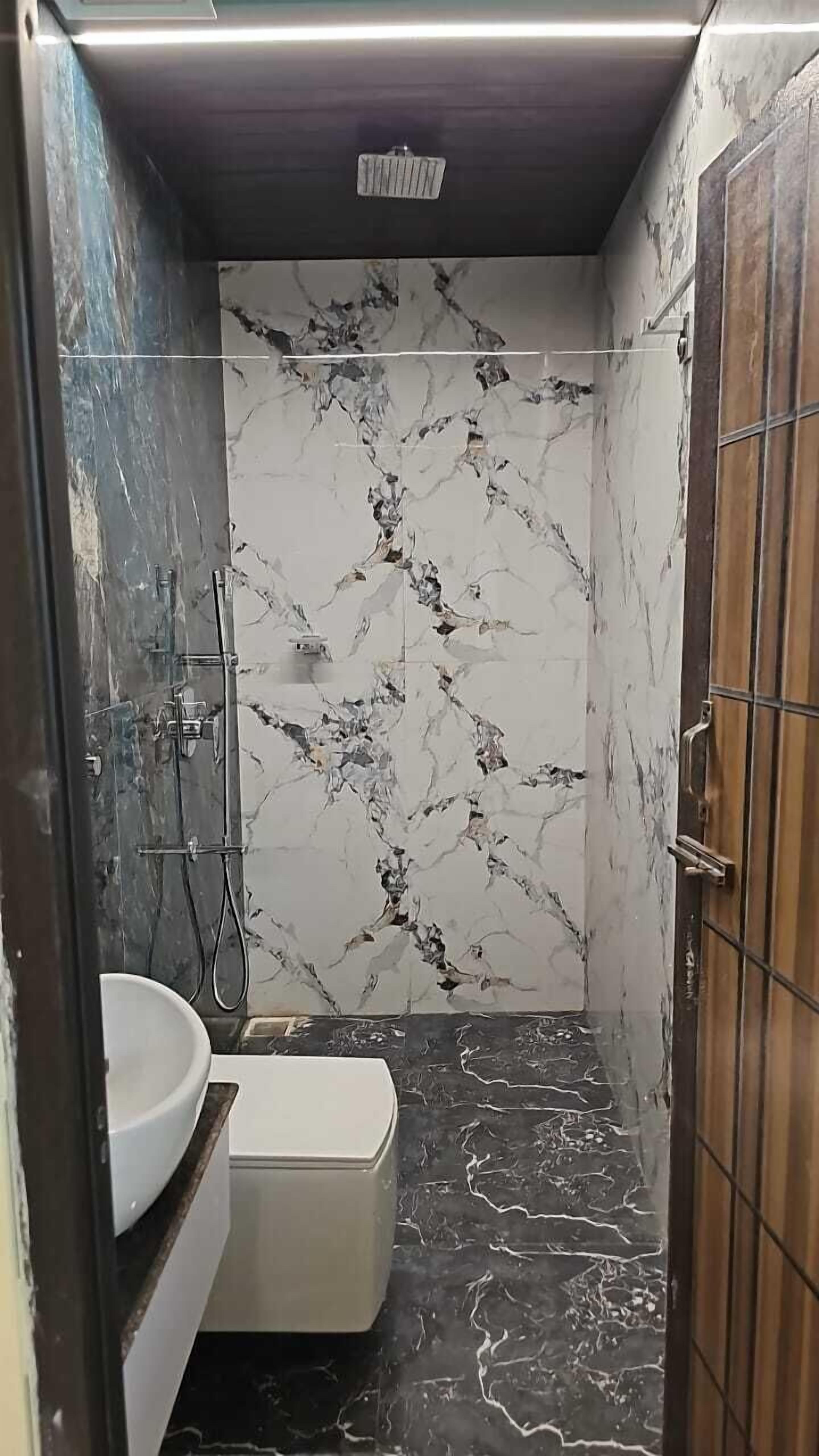 Shower, hair dryer, slippers, towels