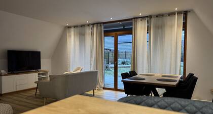 Ferienhaus Reuthsee – Nurdachhaus mit großem Garten & hundefreundlich