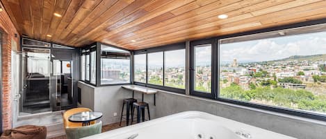 Deluxe Room, Hot Tub, River View | Private spa tub