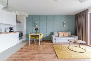 Family Apartment, 1 Bedroom, Balcony, Courtyard Area | Laptop workspace, blackout drapes, iron/ironing board, free WiFi