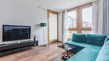 Comfort Apartment, 1 Bedroom, Balcony | 1 bedroom, laptop workspace, blackout drapes, iron/ironing board