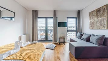 Comfort Studio, Balcony, River View | 1 bedroom, laptop workspace, blackout drapes, iron/ironing board