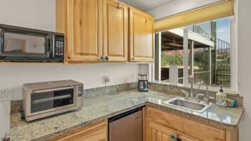 Fridge, microwave, stovetop, coffee/tea maker