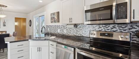 Microwave, stovetop, dishwasher, coffee/tea maker