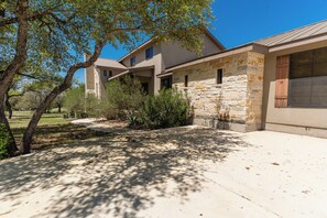Property grounds - Charming two-story vacation home with scenic golf course views. (Concan)
