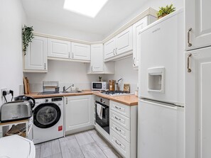 Oven, toaster, cookware/dishes/utensils, dining tables