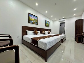 Quadruple Room | Free minibar items, desk, free WiFi, bed sheets - Tam Coc Morning Homestay (Hoa Lu)