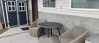 Walkout Garden 1-bedroom  in Grande Prairie AC, WiFi, laundry, parking space