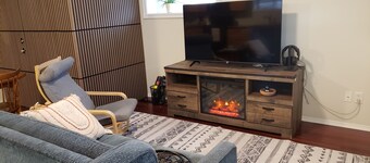 Walkout Garden 1-bedroom  in Grande Prairie AC, WiFi, laundry, parking space