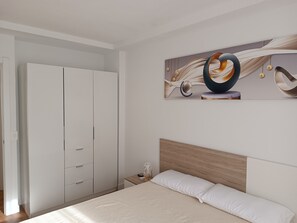 2 dormitorios, tabla de planchar con plancha, wifi y ropa de cama