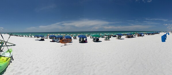 On the beach, sun-loungers, beach towels
