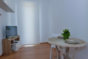 City Apartment, Mountain View | Living area | 42-inch flat-screen TV with digital channels - Allegra Apartment - De Vivo Realty Meta di Sorrento (Meta)
