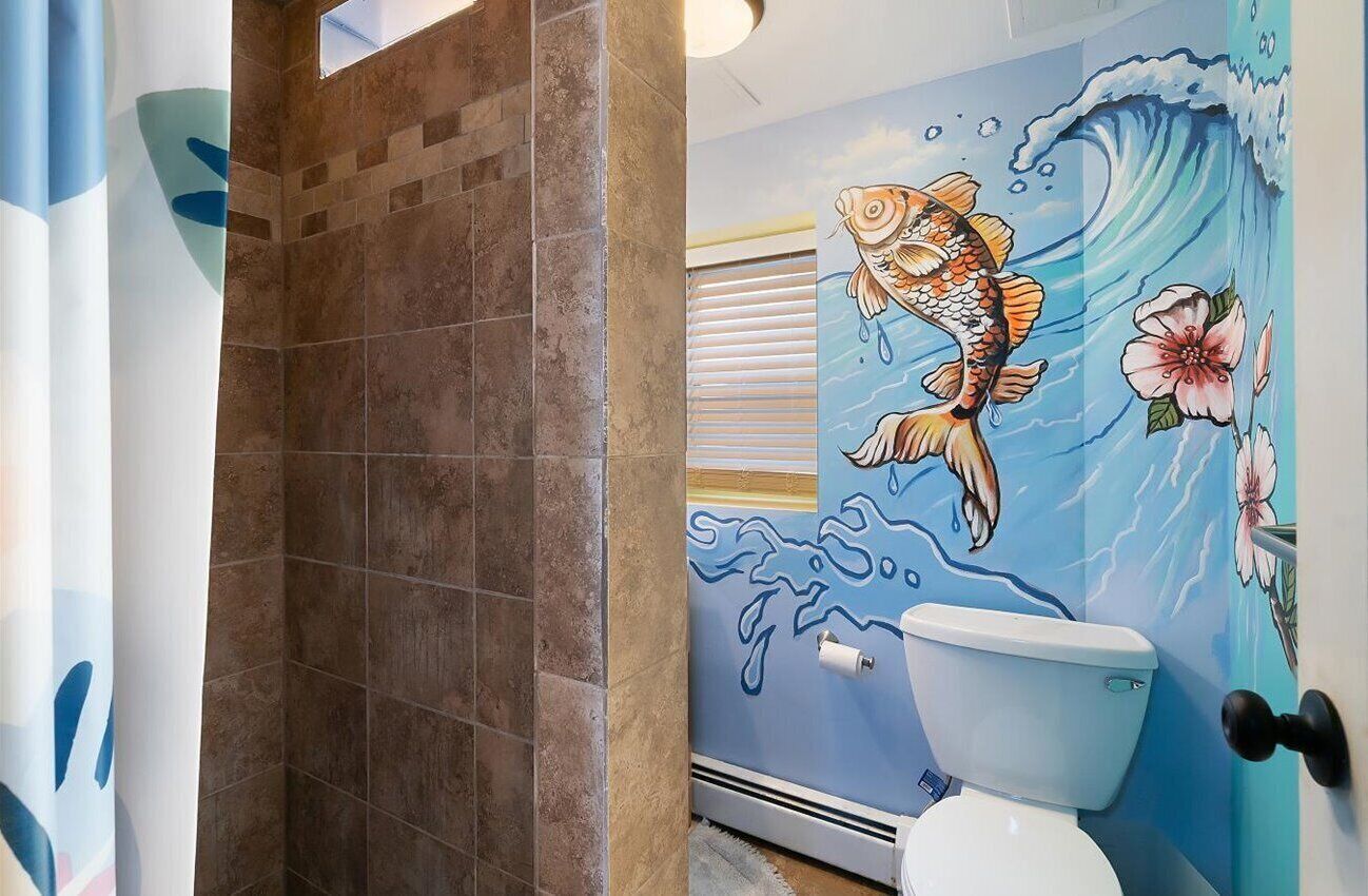 Shower, hair dryer, towels, toilet paper