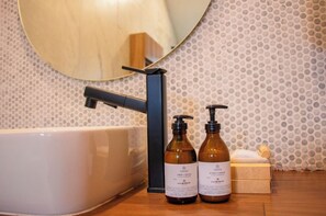 Shower, eco-friendly toiletries, hair dryer, towels