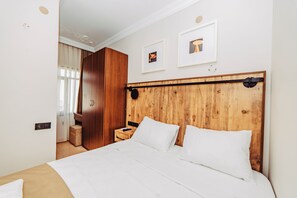 Standard Tek Kişilik Oda | Mısır pamuklu çarşaf takımı, kaliteli yatak takımı, minibar, odada kasa 