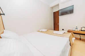 Standard Tek Kişilik Oda | Mısır pamuklu çarşaf takımı, kaliteli yatak takımı, minibar, odada kasa 