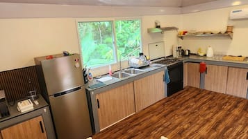 Fridge, microwave, stovetop, coffee/tea maker