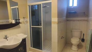 Shower, hair dryer, towels, soap