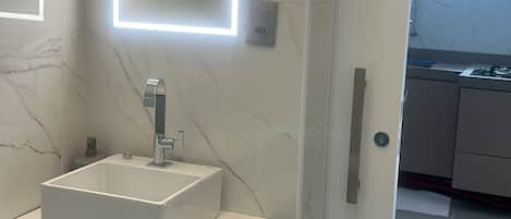 Shower, towels, toilet paper