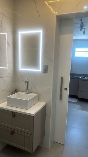 Shower, towels, toilet paper