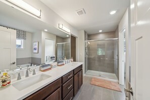 Shower, eco-friendly toiletries, hair dryer, towels