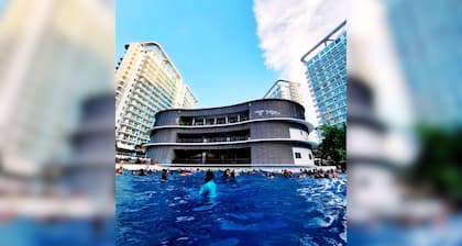 1BR Beach Pool Stay at Azure | Family-Friendly Near SM Bicutan