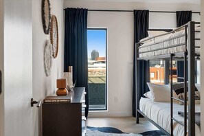 4 bedrooms, desk, iron/ironing board, travel crib