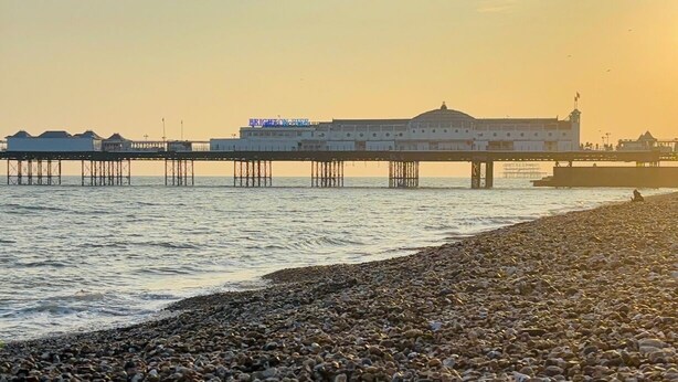 A pier extending into the water with a building labeled "BRIGGINGTON" at the end. - Traditional English House (Brighton and Hove)