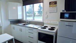 Family Triple Room | Private kitchen