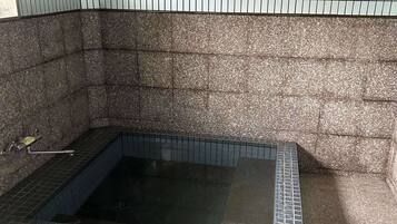 Separate tub and shower, slippers, towels