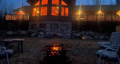 Snowmobile Retreat with Trailer Parking, Screen Porch, Sauna, 3 Bedrooms & Loft.