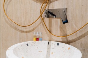 Dutxa, assecador de cabells i tovalloles 