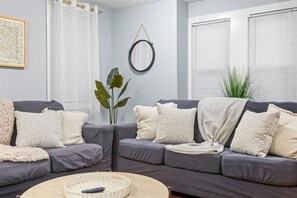 Smart TV, fireplace, books, offices